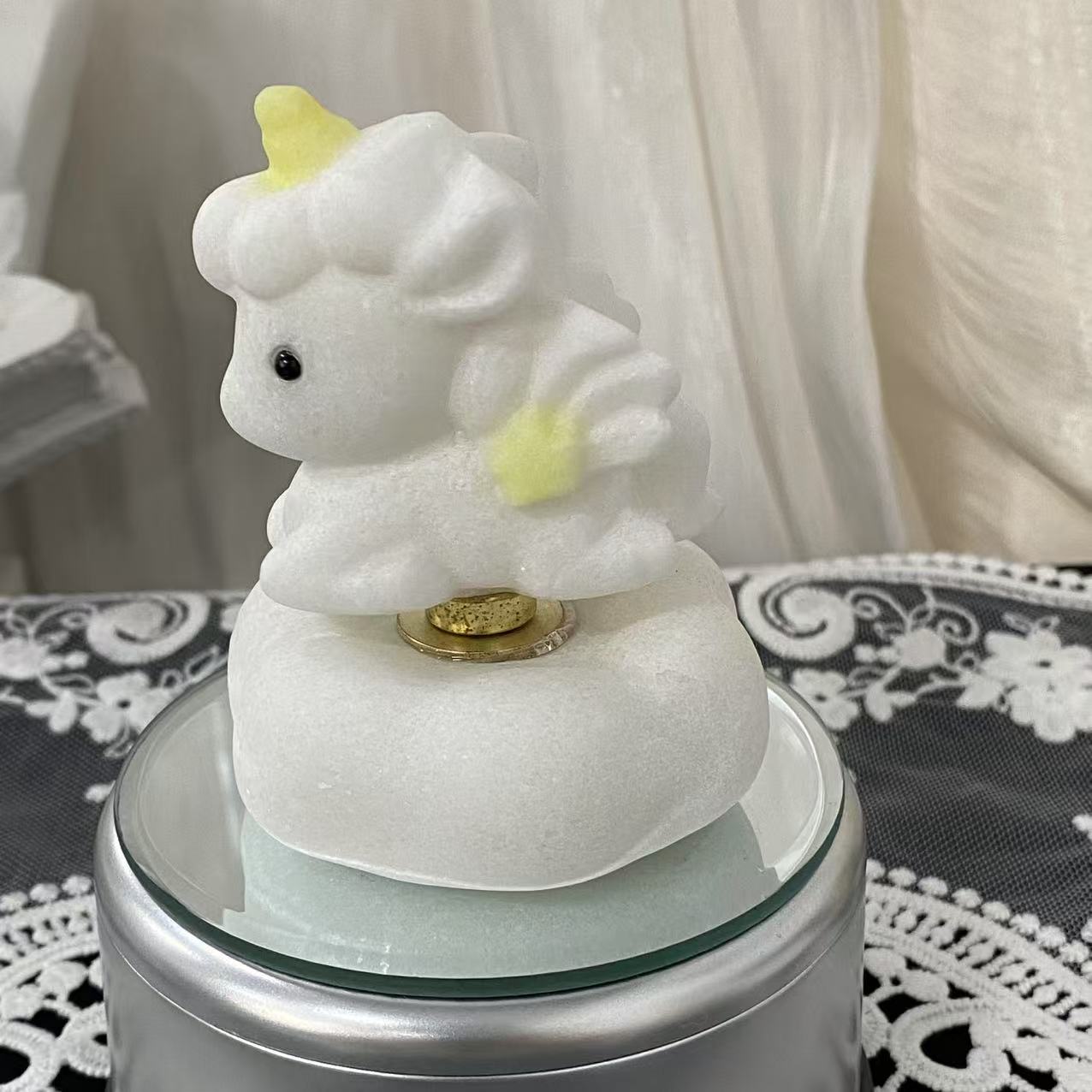 White Jade Spinning Unicorn Carving