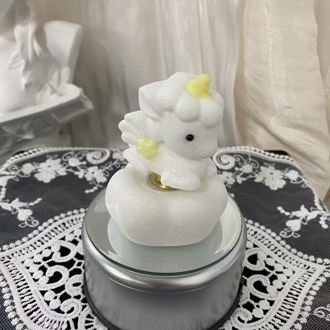 White Jade Spinning Unicorn Carving